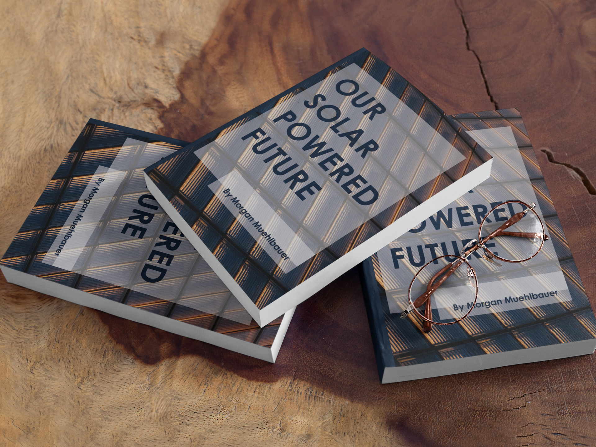 mockup-of-three-books-and-reading-glasses-on-a-wooden-table-a17420